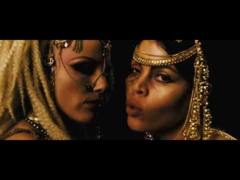 Trailer montage: slow-motion spear throw and dust-choked impact