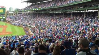 Fans sing &#39;Go Cubs Go&#39; after win in Wrigley