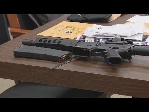 2 arrested after AR-15 found next to teen's bed during search of convicted felon's home