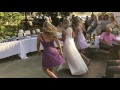 Bride mom and two daughters dance for groom