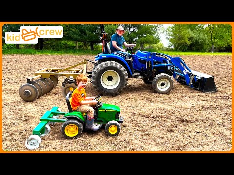 Plowing dirt and planting corn on the farm with kids tractor. Educational front loaders | Kid Crew