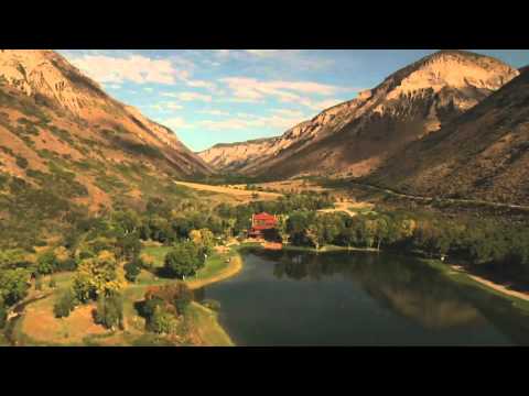 HD Mountain top fly over valley 3 Royalty Free