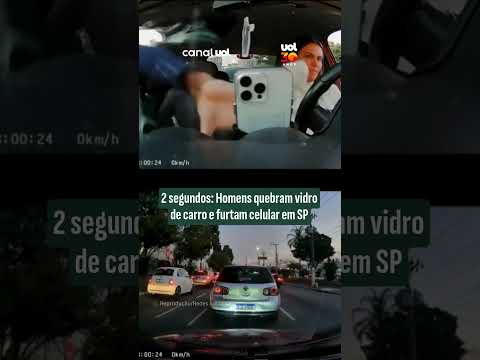 Câmera interna de carro flagra momento em que garupa quebra vidro e rouba celular de motorista em SP