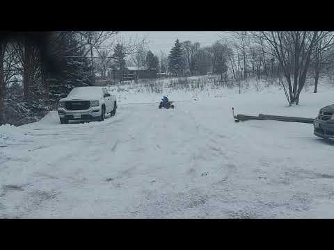 tao raptor 200 just plowed the driveway just some winter fun with the daughter