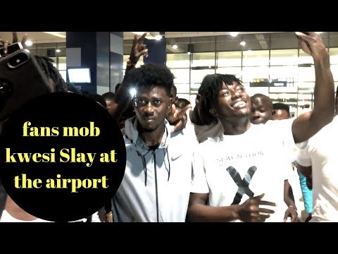 Kwesi Slay mobbed by fans at the airport in his brand new audi car, Onana says he is the best