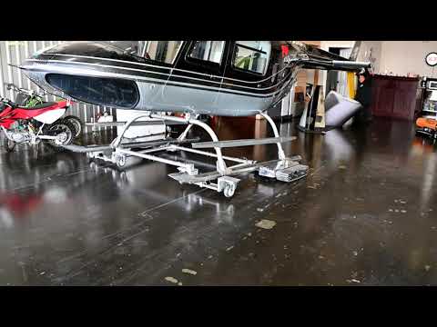 Latching a Helicopter with the Jet Ranger Tug/Bell 206 Tug: A Remote-Controlled Operation