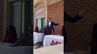 Yusef Jackson speaks on behalf of RPC at the ‘From Black Out to Black Buyout’ event.