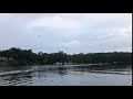 Plane landing over scullers