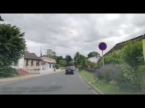 Driving from Stralsund to the Island oglf Rugen via old bridge/Deutschen Alleenstraße /Rugen Germany