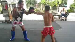 preview picture of video 'Bor PhetPintusopon: An eleven year-old hitting the pads'