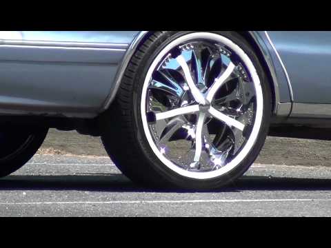 Chevy car with 22 inch SPINNER CHROME RIMS!!!!!