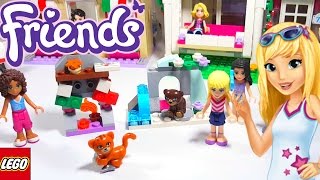 YouTube thumbnail: Lego Friends Christmas Fireplace and Biscuit the bear in the Snow Cave polybags Building Review