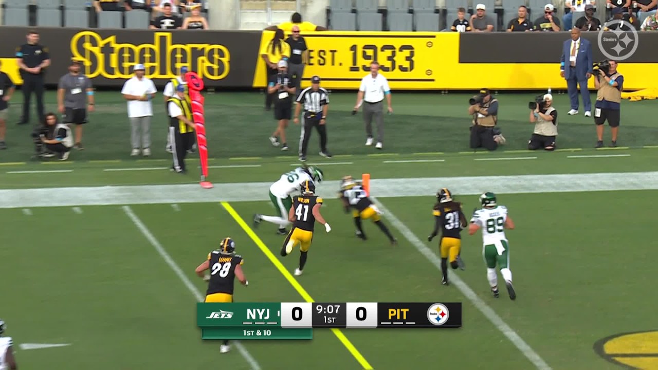 Geno Smith's TD pass to Jelani Woods involves a shoulder-charge finish at goal line