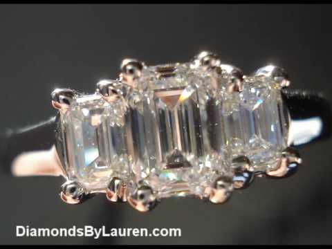 One carat total weight three stone emerald cut diamond ring