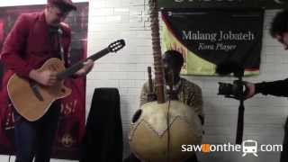 Guitar drumsticks and a Kora player NYC underground jam