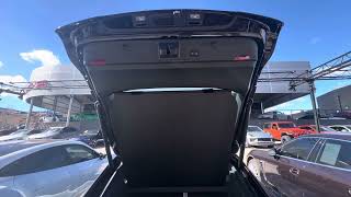 How to set the rear hatch open height in a Porsche Panamera