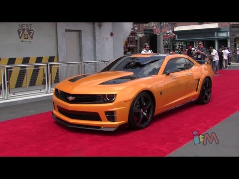 Optimus Prime, Bumblebee, Megatron transform & talk at Transformers grand opening in Orlando