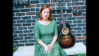 Near the cross sung by Iris Dement
