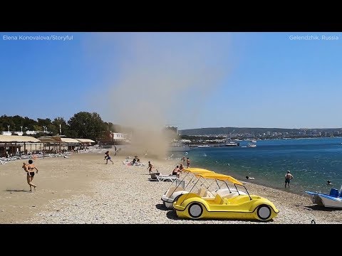 Dust devil sends chairs, small boat flying at seaside resort