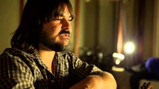 Chris Mulé of Honey Island Swamp Band (Sitting Down)