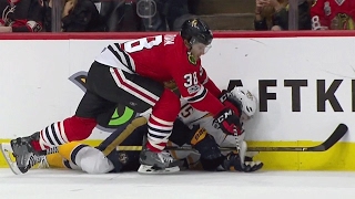 Hartman given game misconduct for punching a downed Smith in the face