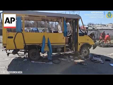 Video Thumbnail: Russia drone strike hits moving bus in Kherson, injured helped into ambulances