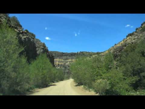 Time Lapse Video Windshield view of a dusty road while driving