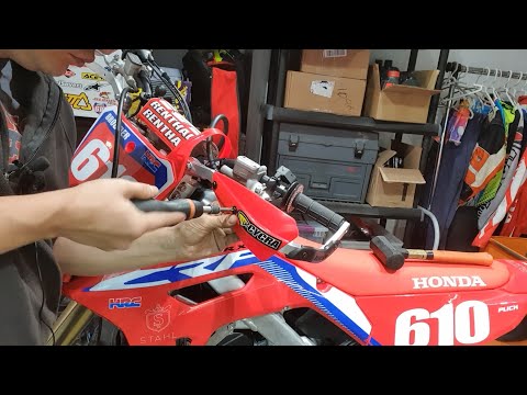 Fitting Cycra hand guards to an enduro motorcycle.