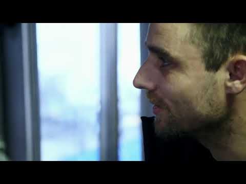 High angle on stacked pots as a line pays out into rough gray water