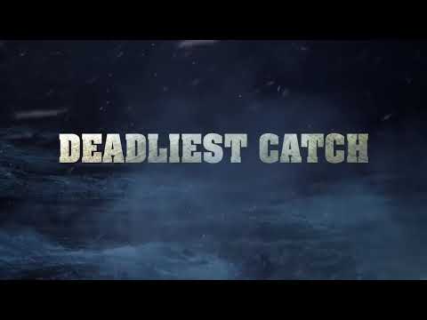 Trailer frame: waves breaking over the bow while crab pots are stacked high