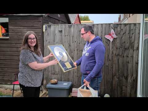 Ewan Galloway receiving his special award and gifts