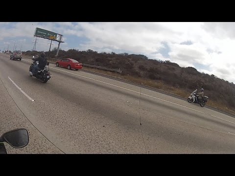 California Highway Patrol motorcycle cop breaks the law.