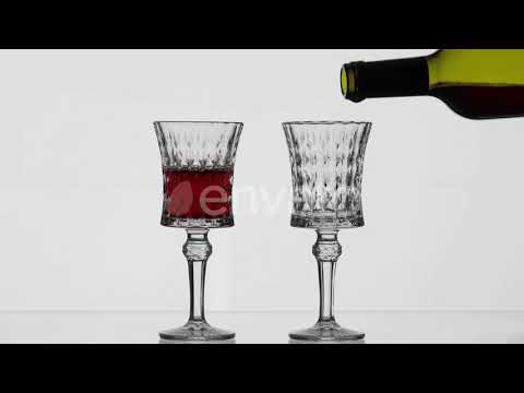 Rose Wine. Red Wine Pour in Two Wine Glasses Over White Background | Stock Footage - Envato elem...