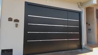 Portão revestido em acm ,