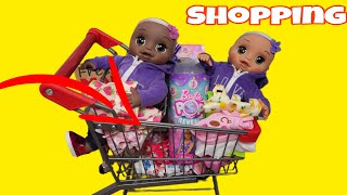 Baby Alive baby doll twins go shopping for new clothes and toys