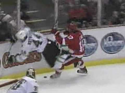 Patrick Eaves drills Jeff Woywitka