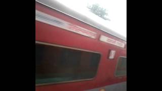 preview picture of video 'TVC Rajdhani 12431 crossing TVC rajdhani 12432 At Nandgaon road station'