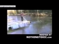 Fat kid breaks the ice on a frozen lake! 