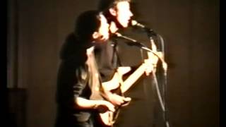 Example: None sings Hello Cruel World in Iowa City, 1992