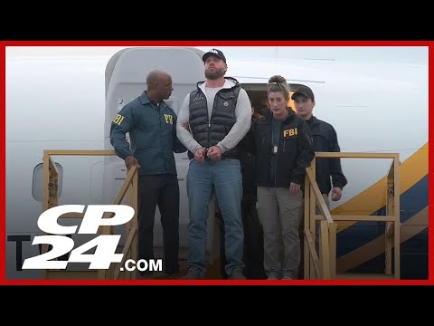 Alleged drug kingpin Ryan Wedding escorted off plane after his arrest