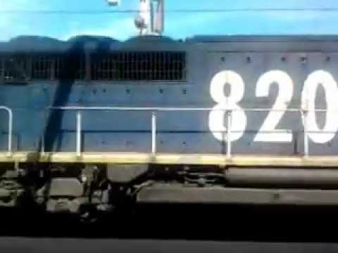 Pacific National 8238 works a coal tain through Wollongong with 8211 with 8208 and BL28