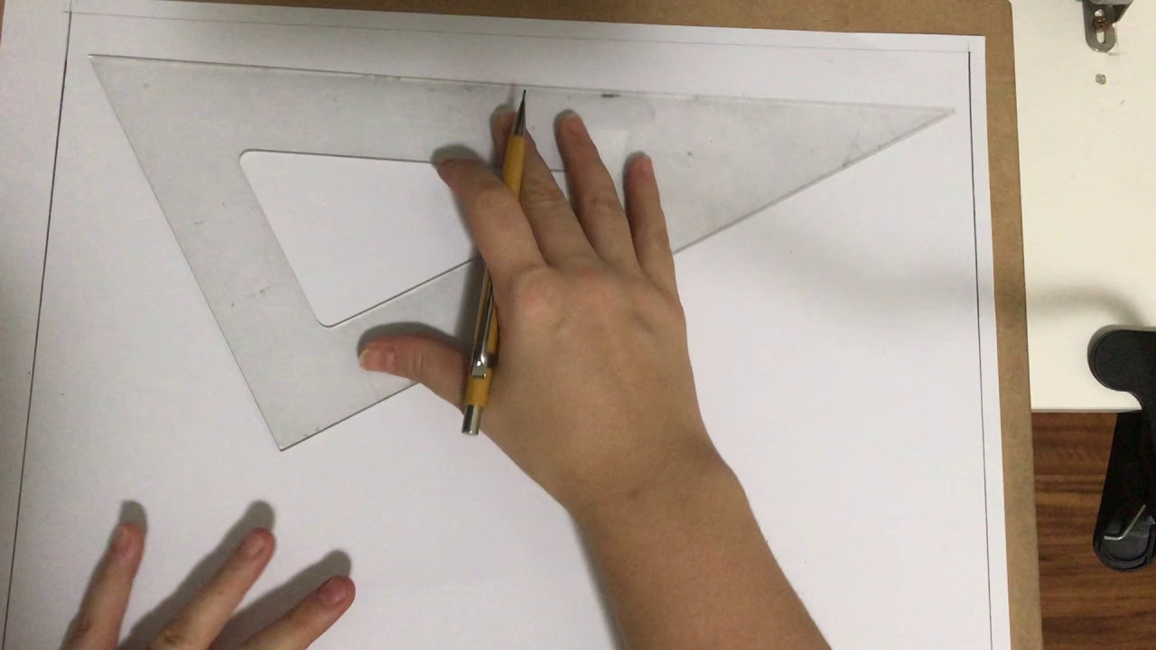 Aula sobre desenho de margem e dobra de folha A3