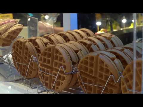 Popular and crispy Korean waffles with Ice Cream and cheese. Street food.