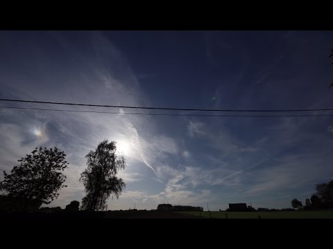 2017-05-14 Plane trail residue causes very bright hotstpots and partial halo