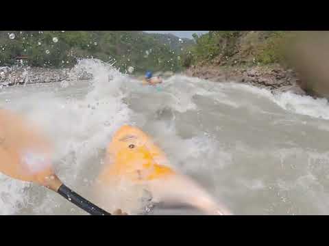 white water kayaking and golf course rapid in rishikesh in slow mo