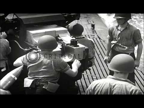 The five-inch-twenty-five Caliber deck gun on surfaced submarine at sea, United S...HD Stock Footage