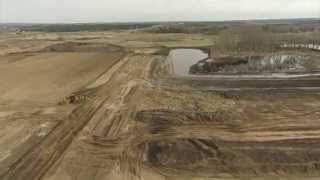 preview picture of video 'Quick flight over Aspelund Industrial area, Piherneys trucking doing the dirt work'