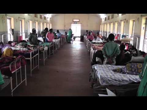 African women wait to see doctor in Jinja hospital, Africa