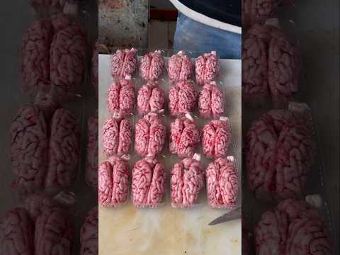 Butcher Splitting Pig Head and Packing Pig Brain 👀