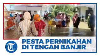 Viral Video Pasangan Nekat Gelar Pesta Pernikahan di Tengah Genangan Banjir: Akad Tetap Lancar